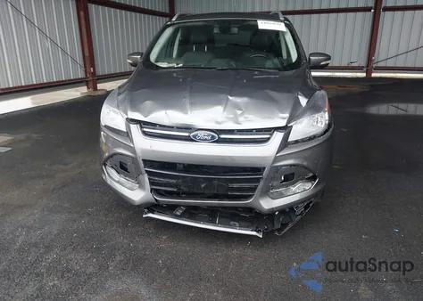 2014 Ford Escape Titanium z USA, uszkodzony, nr VIN 1FMCU0J91EUE57538